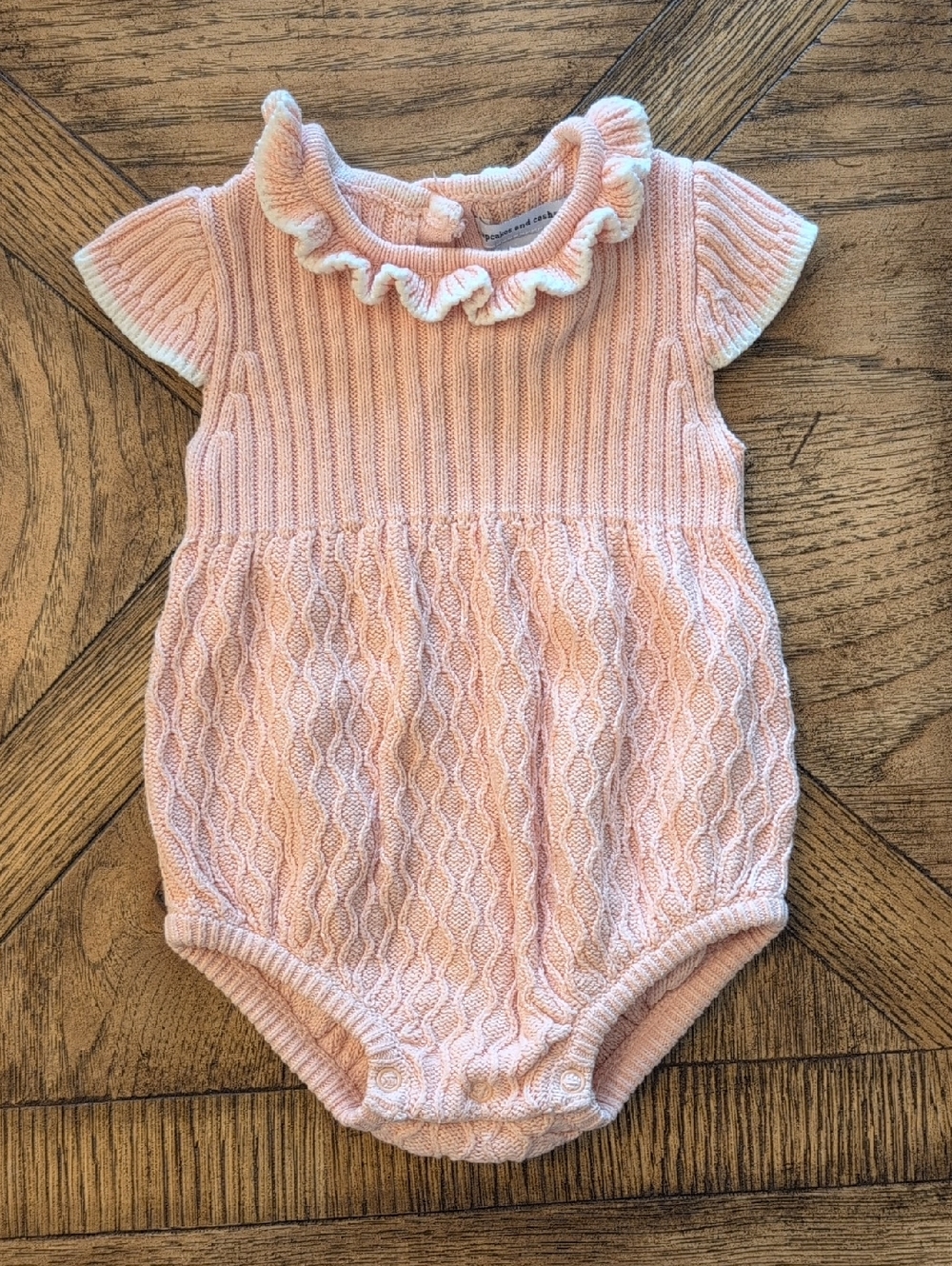 cupcakes & cashmere Baby Knit Ruffle Romper in Pale Pink